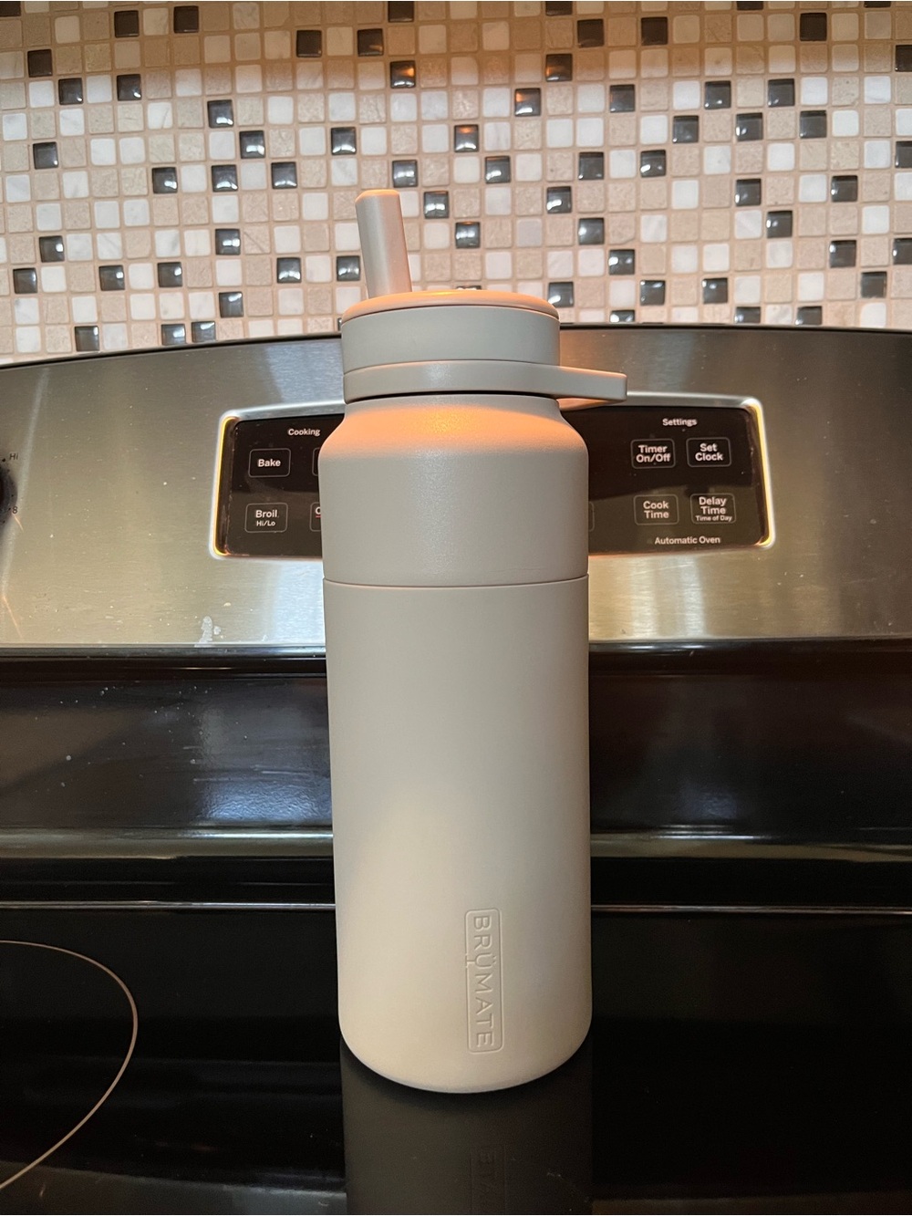 Brümate Rotera 35 OZ Cream Insulated Water Bottle with Straw Lid
